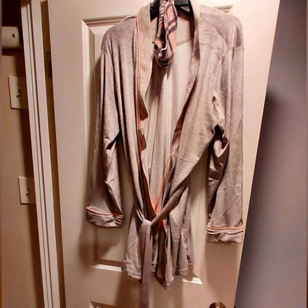 JOYSPUN BATHROBE WOMANS SIZE MEDIUM WITH EYE MASK, SUPER SILKY AND WORN MAYBE 1